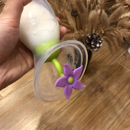 Immagine di Haakaa® Chiusura a fiore per il tiralatte Purple